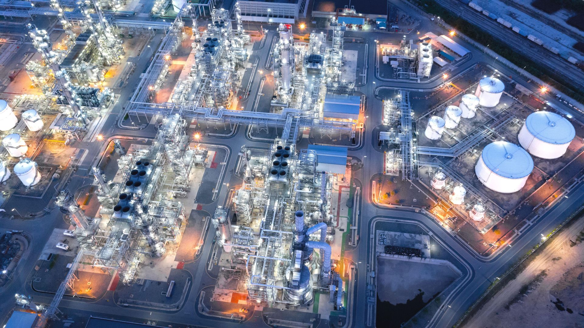 Aerial view of a refinery complex at dusk